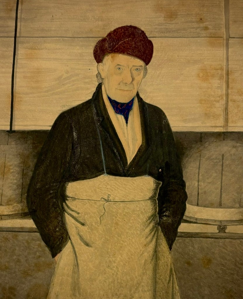 Close up of painting of Sam Wells his reddish hat has turned up sides. His hair is collar length and white, his nose is prominent his eyes blue and kindly. He had an indigo neckerchief and black coat on. Underneath his coat and apron is a clean white shirt. The coat may have once been dark green but has faded with age. 